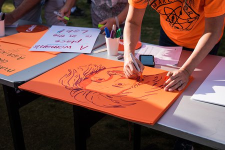 The Caltech Postdoctoral Association provided materials so that participants could make signs