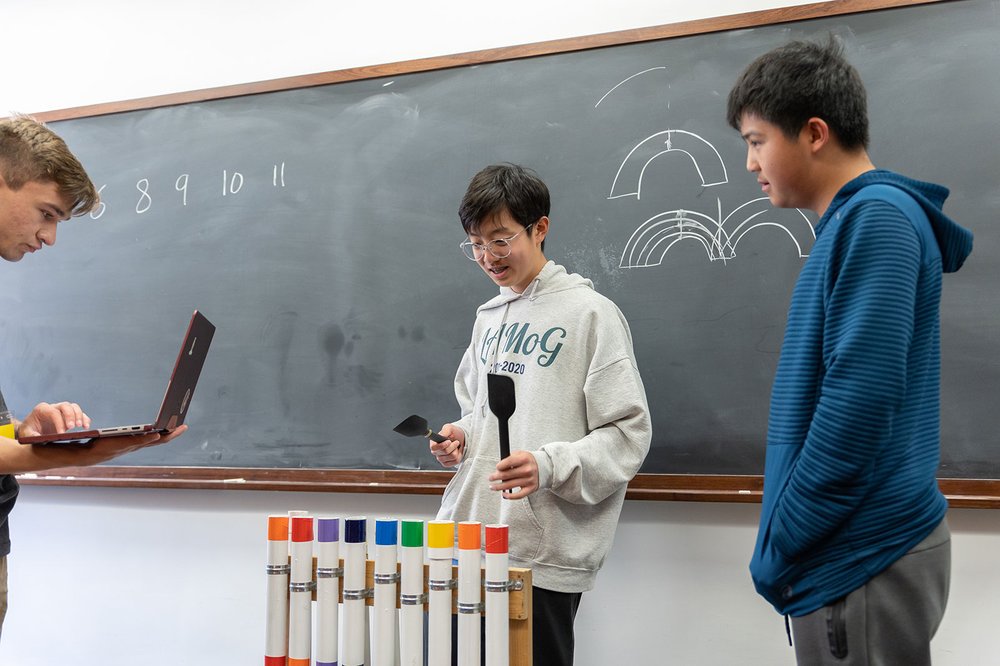 A student plays a thongophone at the "Sounds of Music" event