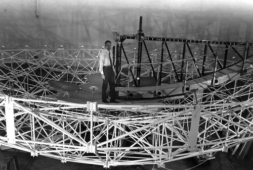 Robert Leighton is pictured standing on one of the mirrors he designed while it was being first assembled and the reflecting surface cut to shape.