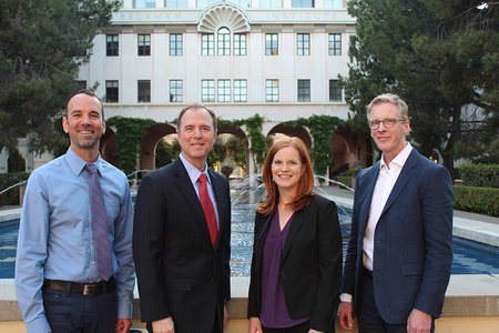 photo of Adam Schiff and panelists before town hall meeting at Caltech