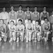 A black and white photo of a team of Caltech students and coaches from the 1950s. The men in the front row are kneeling.