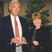 David Grether and Susan Grether stand in front of a Christmas tree.