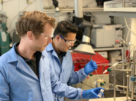 Researchers conduct laboratory work to convert carbon dioxide to ethylene.