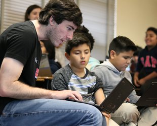 A Caltech senior helps a third-grade boy learn to code.