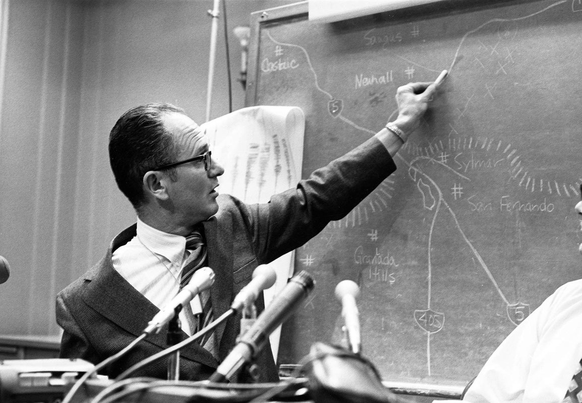 Clarence Allen answers questions about the San Fernando Earthquake during a press conference at the Seismological Laboratory on February 10, 1971.