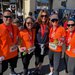 participants in the Firecracker Run wearing orange t-shirts