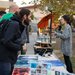 Event attendees check out a "rotating table" experiment that reproduces the influence of Earth's rotation on ocean currents.