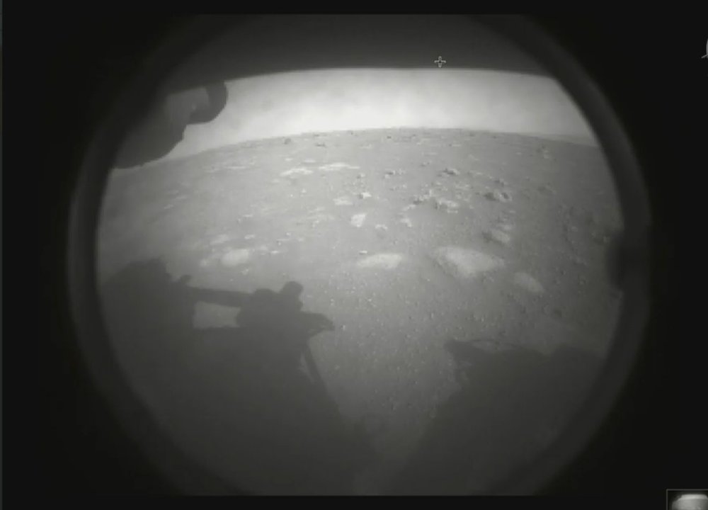 A black-and-white image of a rocky surface.