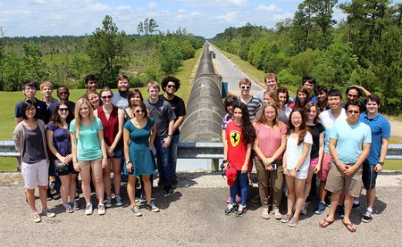 LIGO SURF students on beam pipe