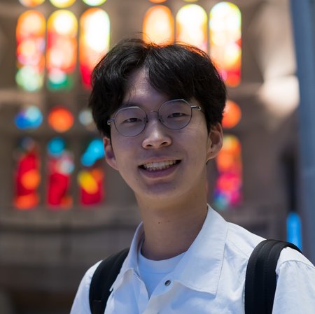 A person smiles for a photo