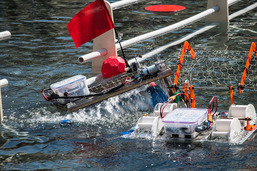 Robots scramble to collect floating balls