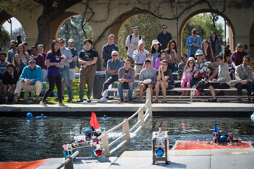 Bystanders gather to watch the 2019 ME72 competition